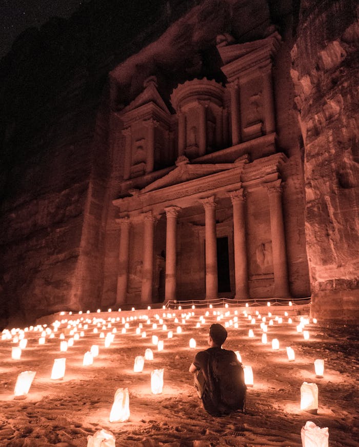 Experience the enchanting glow of candlelit Petra, a UNESCO World Heritage site, under the stars.